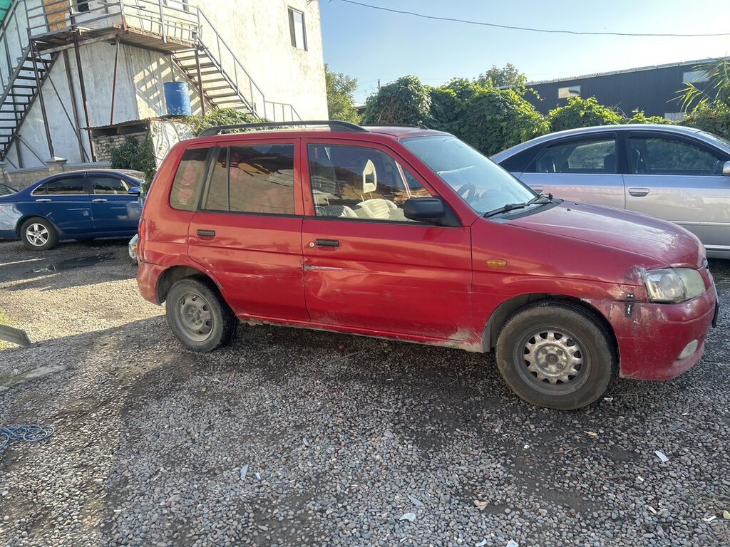 Mazda Demio: 2001 г., 1.5 л, Хэтчбэк: фото 5