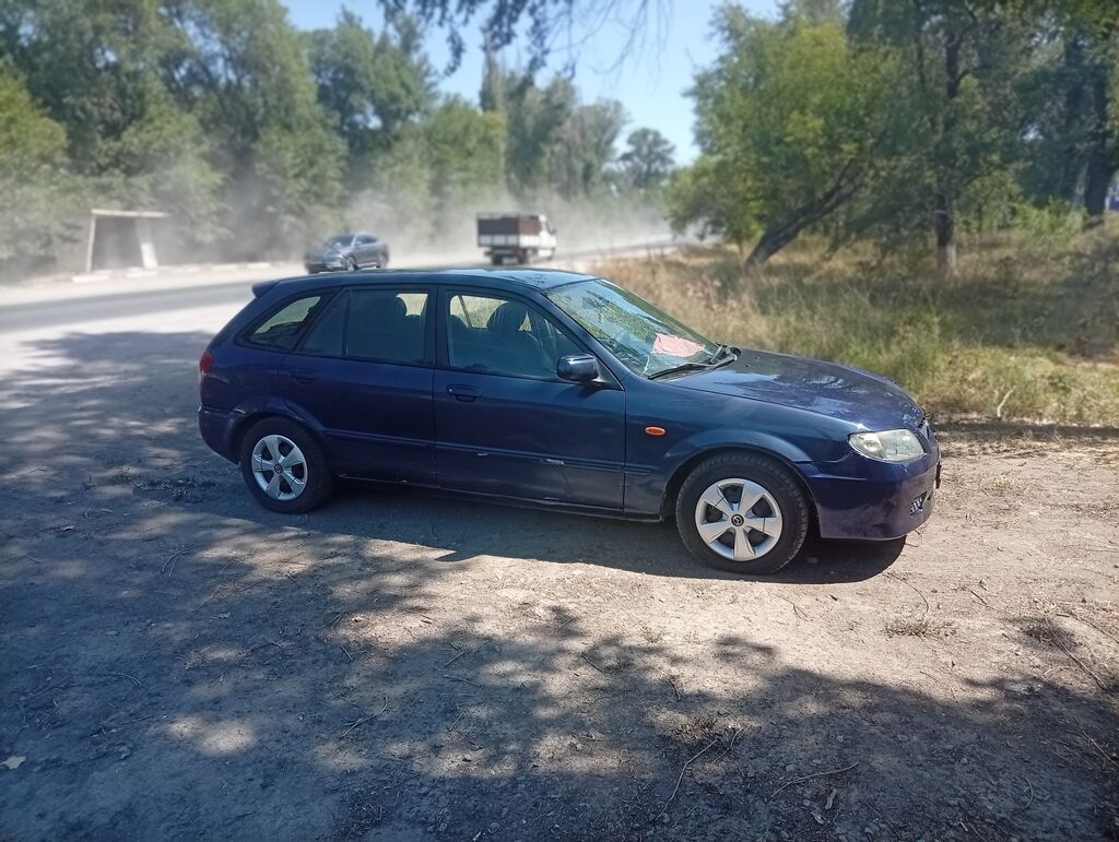 Mazda 323: 2001 г., Универсал: фото 8