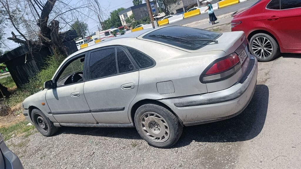Mazda 626: 1999 г., Седан — фото 5