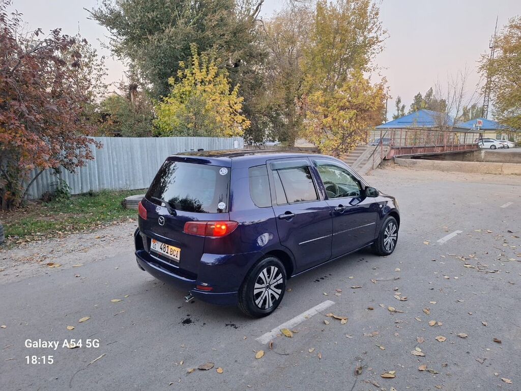 Mazda Demio: 2003 г., 1.3 л, Автомат, Бензин, Хэтчбэк: фото 4