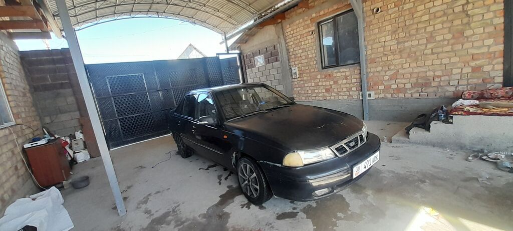 Daewoo Nexia: 2008 г., 0.8 л, Механика, Бензин, Седан: фото 2