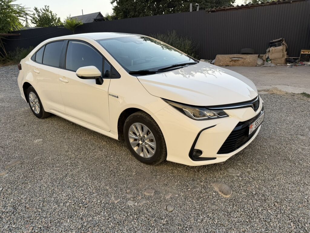 Toyota Corolla: 2019 г., 1.8 л, Автомат, Гибрид, Седан: фото 2