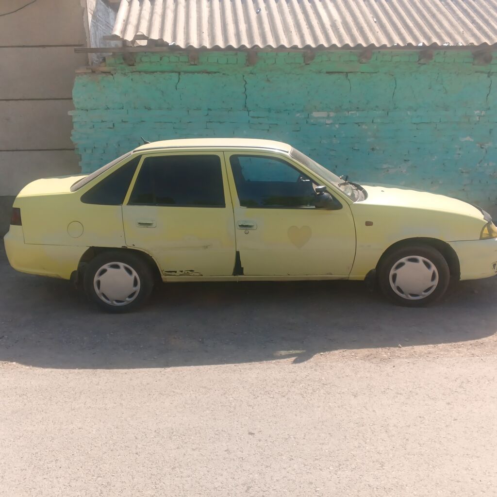 Daewoo Nexia: 2010 г., Седан: фото 4