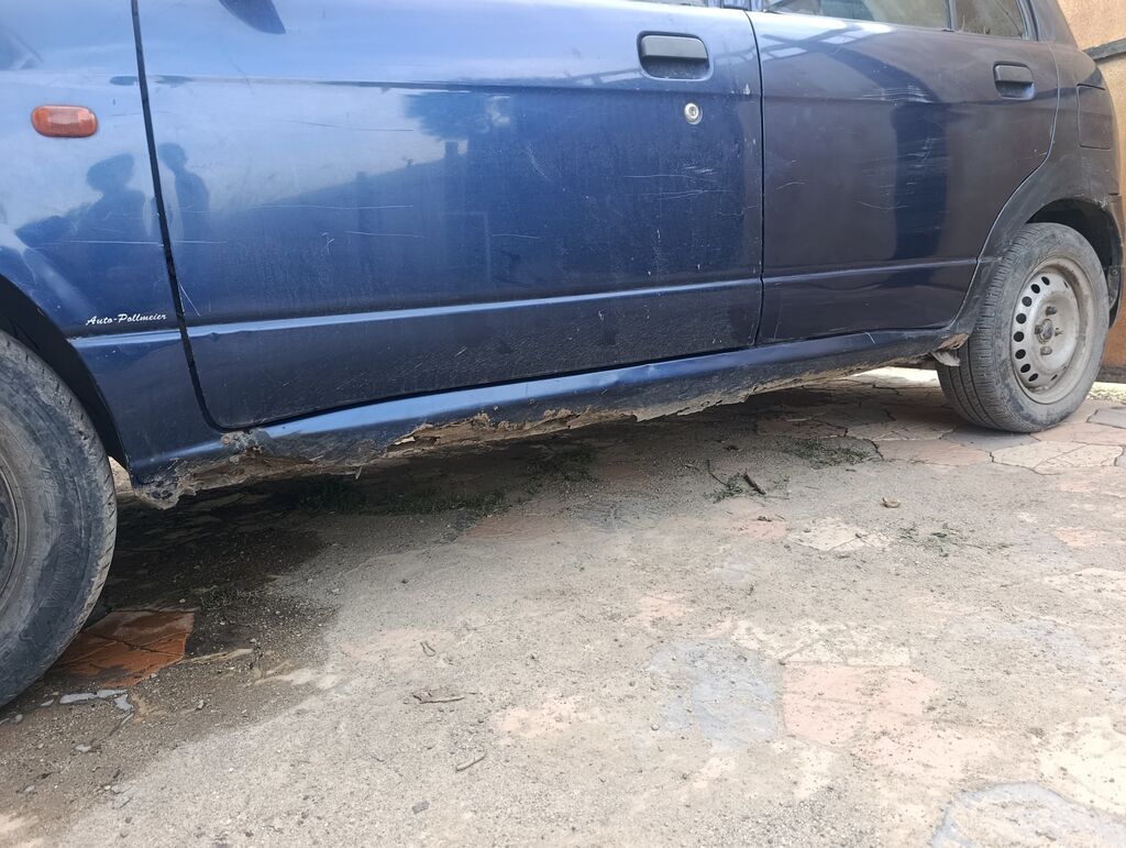 Daihatsu Cuore: 2003 г., 1 л, Механика, Бензин, Универсал: фото 8