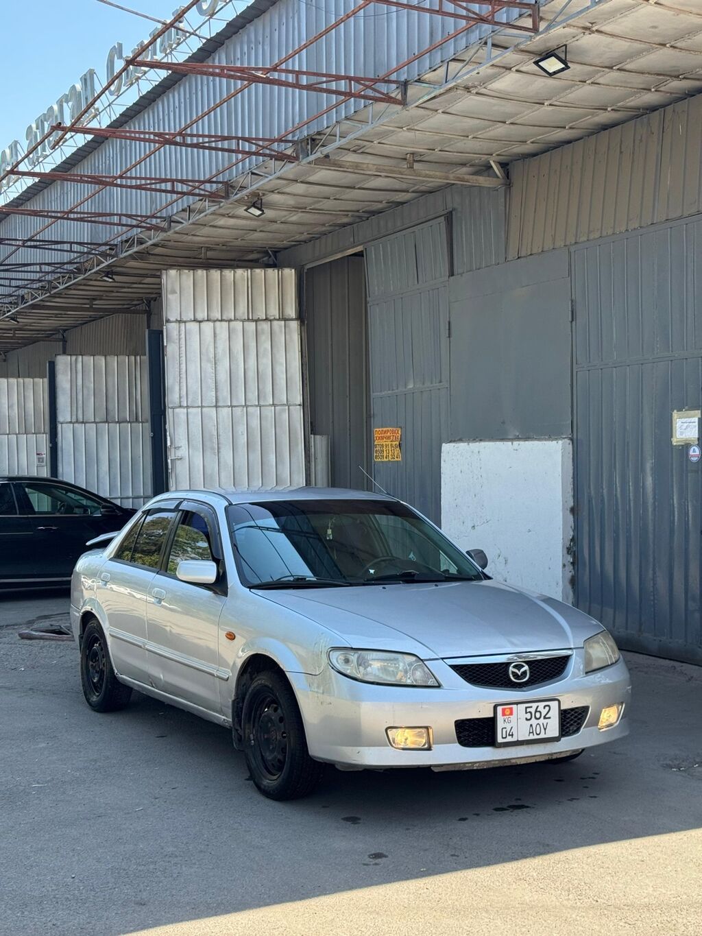 Mazda 323: 2002 г., 1.6 л, Автомат, Бензин, Седан: фото 5