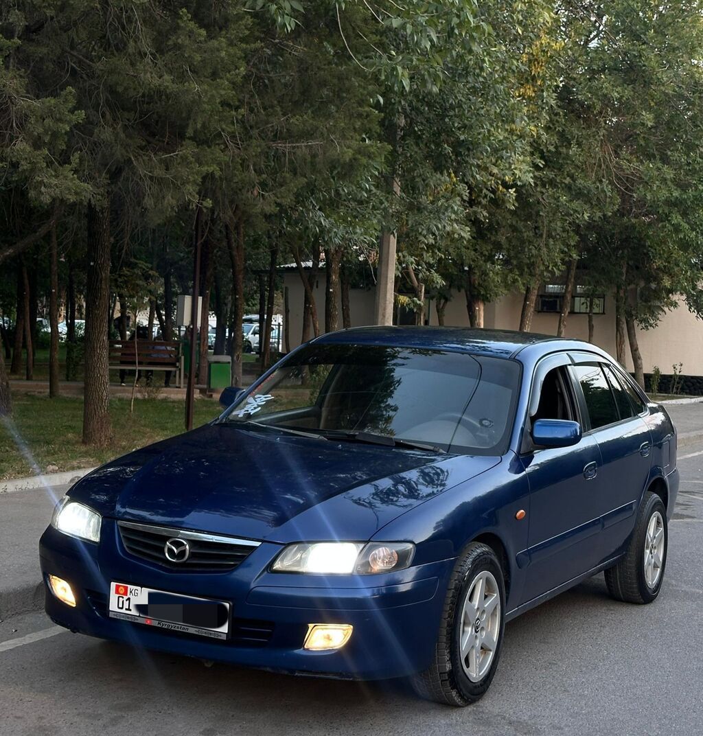 Mazda Capella: 2000 г., 1.8 л, Механика, Бензин, Хэтчбэк: фото 7