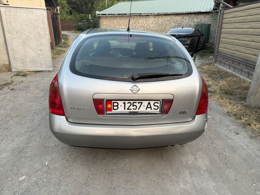 Nissan Primera: 2004 г., Механика, Универсал: фото 2