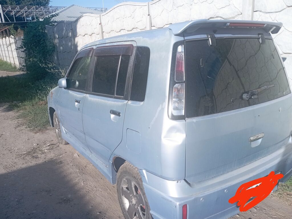 Nissan Cube: 2002 г., Внедорожник: фото 2