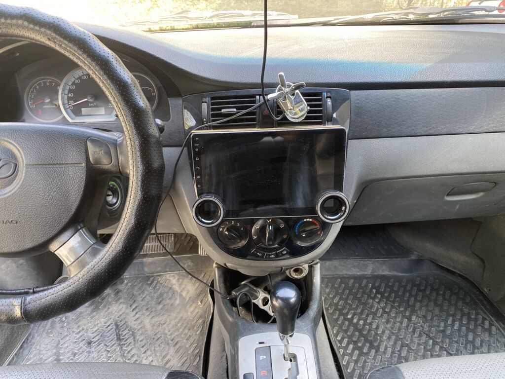 Daewoo Lacetti: 2008 г., 1.6 л, Автомат, Газ, Седан: фото 8