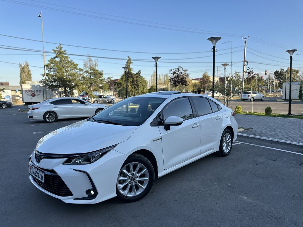 Toyota Corolla: 2021 г., 1.8 л, Вариатор, Гибрид, Седан: фото 4