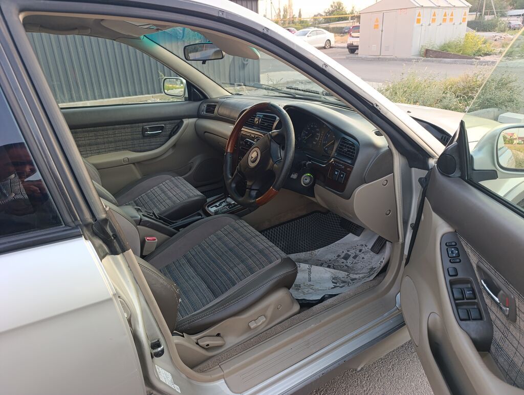 Subaru Legacy Lancaster: 1999 г., 2.5 л, Автомат, Газ, Универсал: фото 6