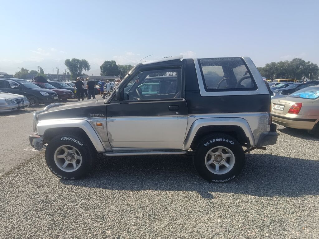 Daihatsu Feroza: 1991 г., 1.6 л, Механика, Бензин, Внедорожник: фото 3