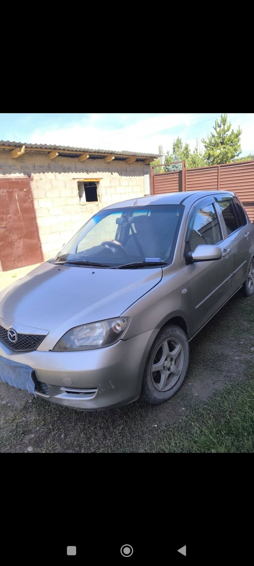 Mazda Demio: 2005 г., 1.3 л: фото 1
