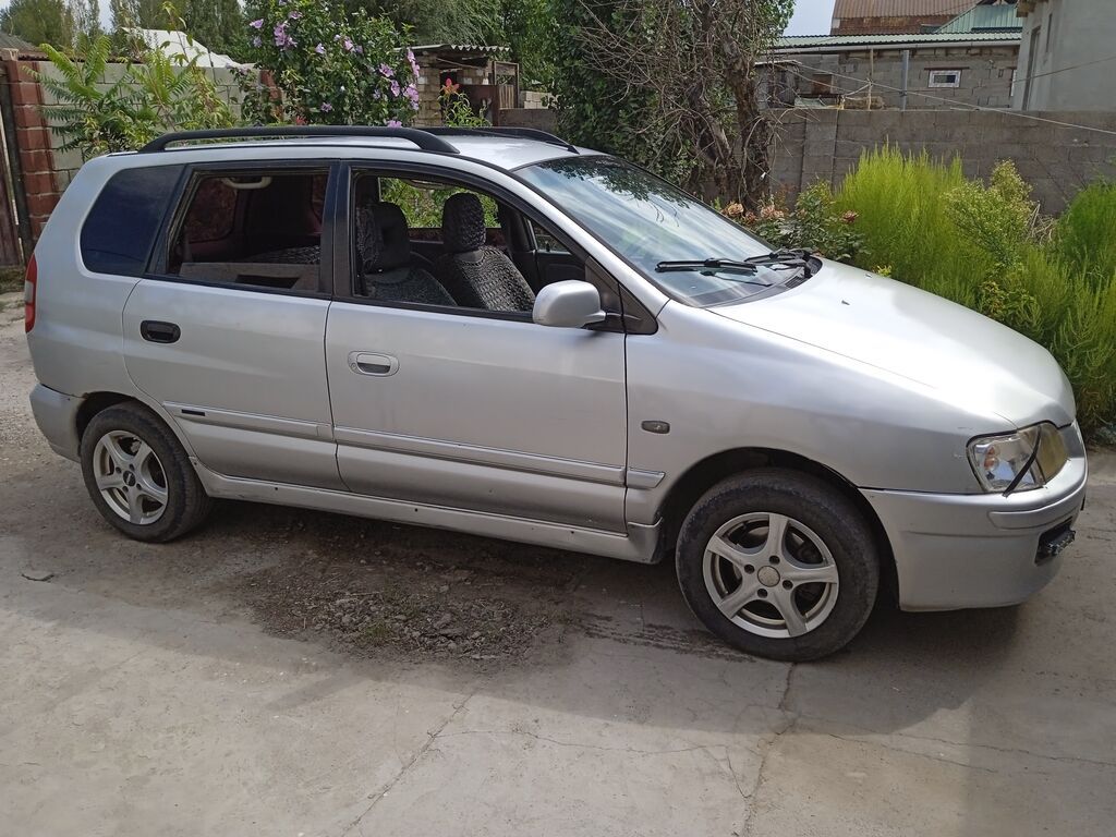 Mitsubishi Space Star: 2002 г., 1.6 л, Механика, Бензин, Седан: фото 3