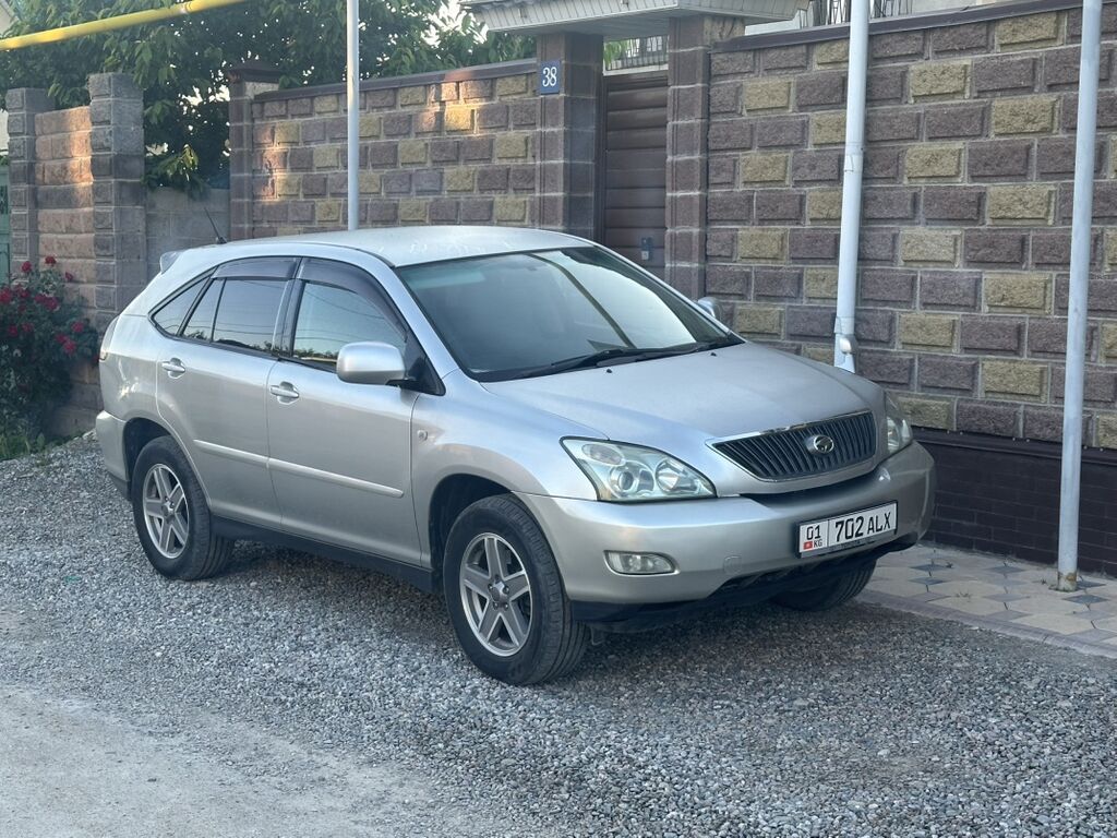 Кроссовер (праворульный) серебристого цвета в кузове 5‑дверный SUV: фото 2