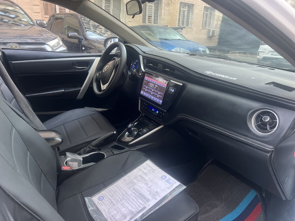 Toyota Corolla: 2019 г., 1.8 л, Вариатор, Гибрид, Седан: фото 5
