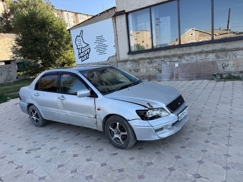 Mitsubishi Lancer: 2001 г., 1.6 л, Автомат, Бензин, Седан: фото 7