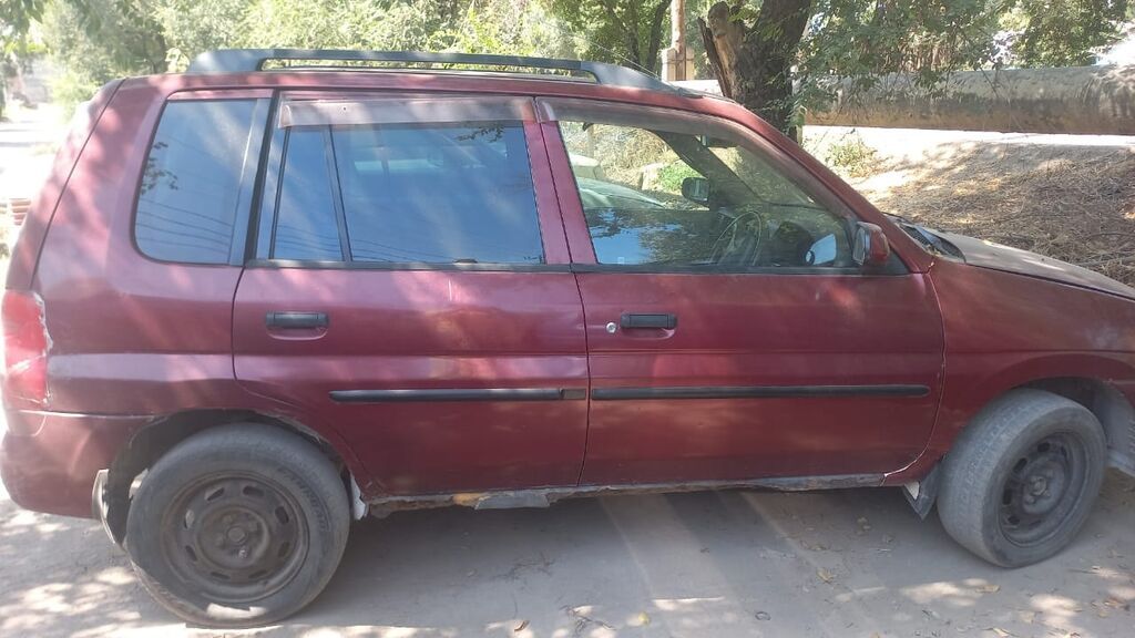 Mazda Demio: 1999 г., 1.3 л, Автомат, Бензин, Хэтчбэк: фото 2