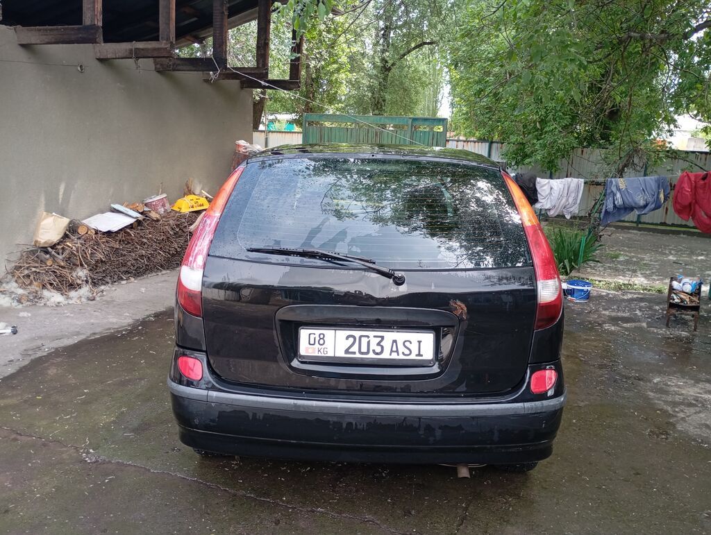 Nissan Almera Tino: 2002 г., 1.8 л, Механика, Бензин, Универсал: фото 3