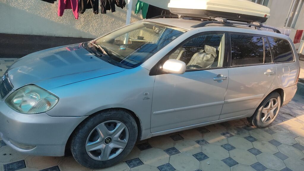 Toyota Corolla: 2003 г., 2 л, Механика, Бензин, Универсал: фото 2