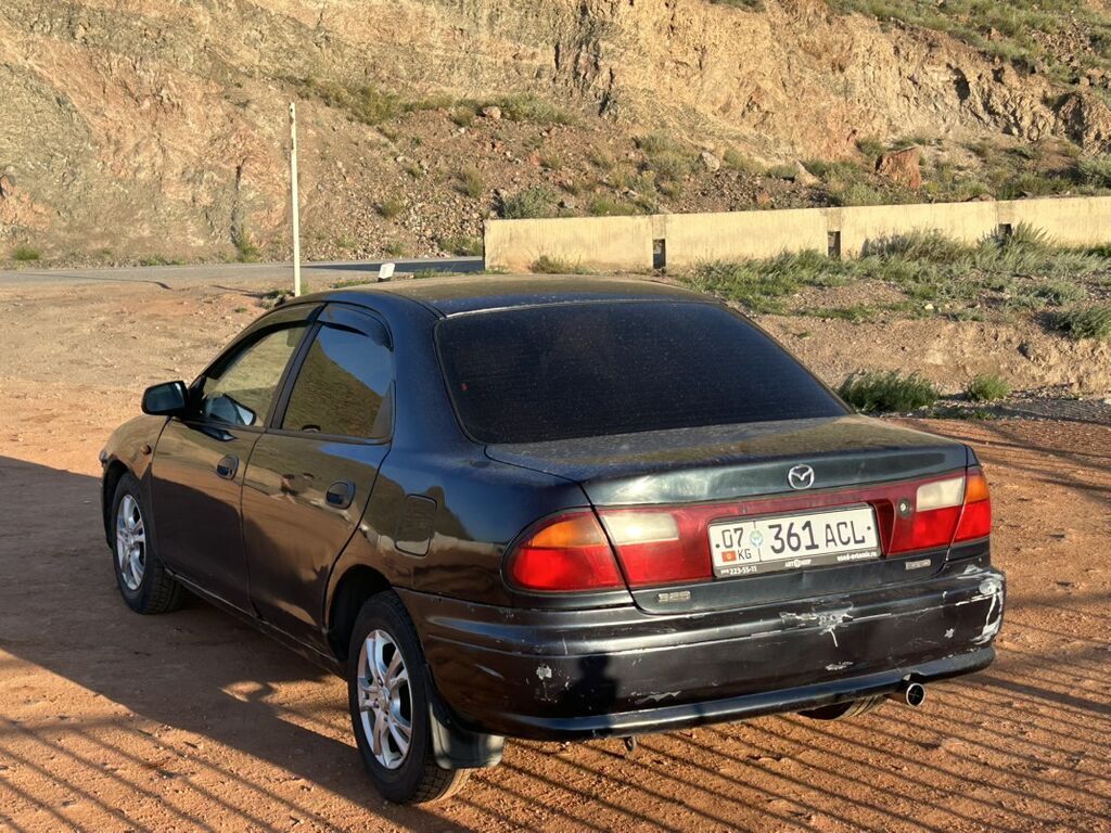 Mazda 323: 1999 г., 1.5 л, Автомат, Бензин, Седан: фото 3