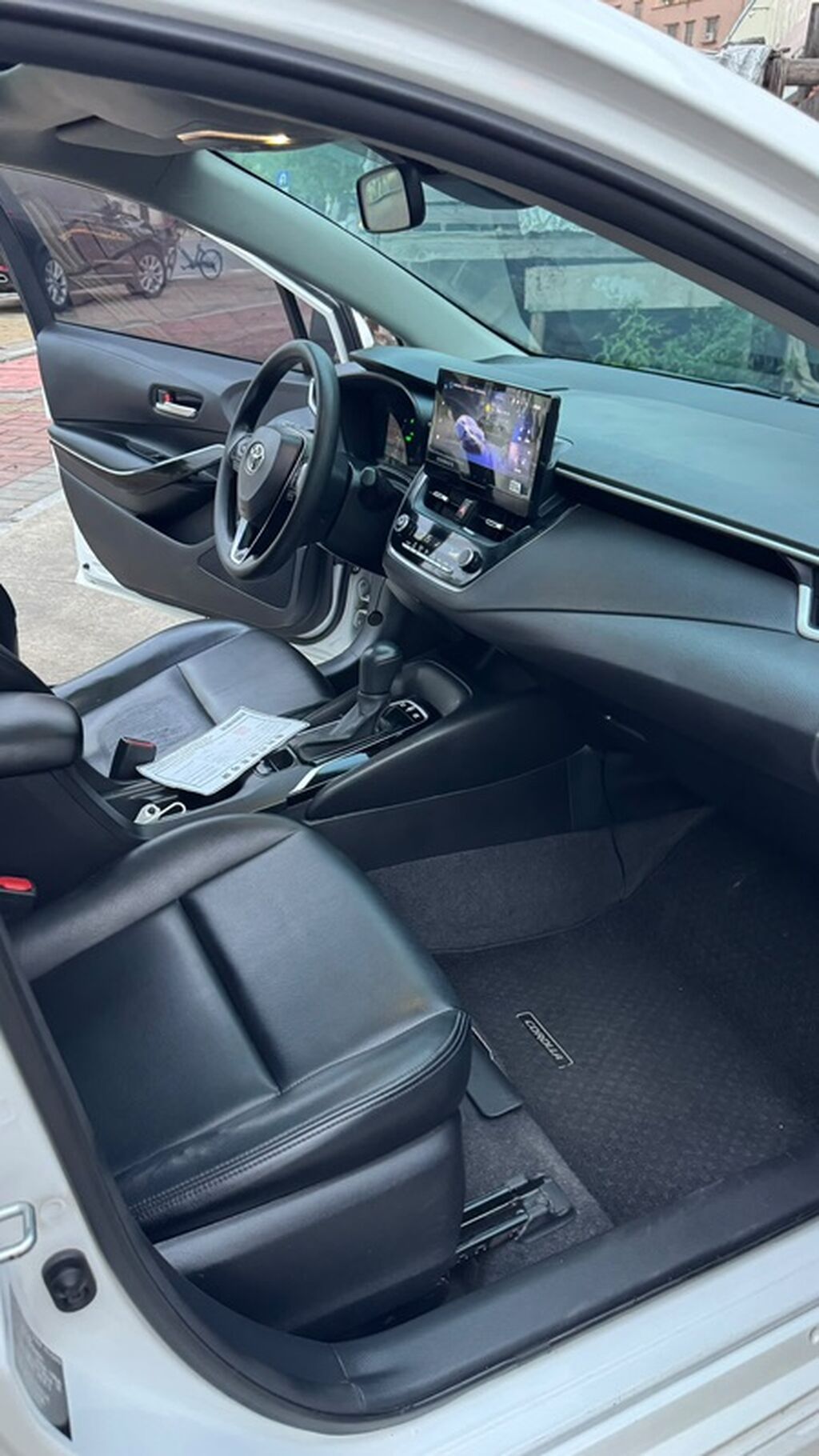 Toyota Corolla Hybrid 2023, седан, 1.8 л: фото 8