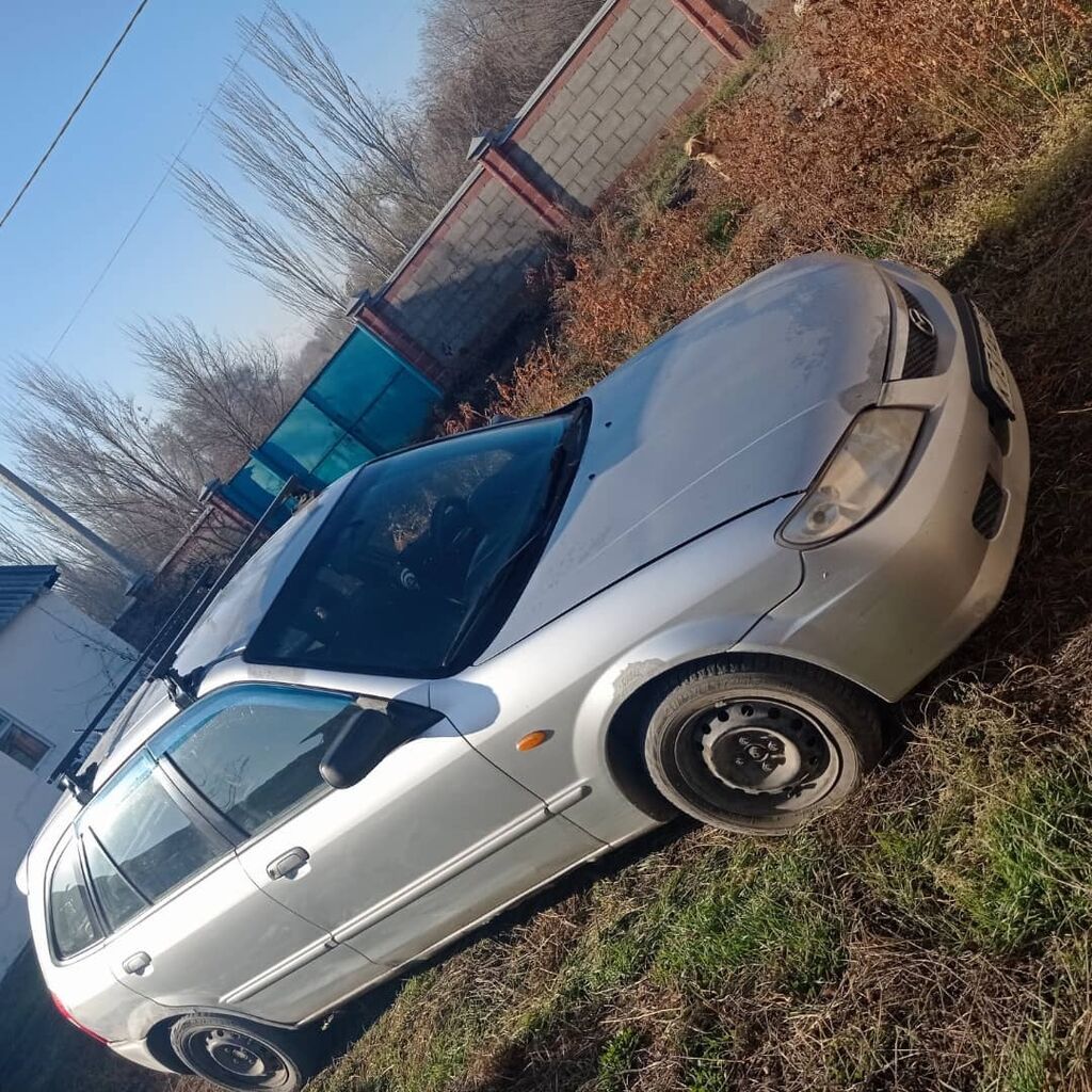 Mazda 323: 2000 г., 1.6 л, Механика, Бензин, Универсал: фото 1