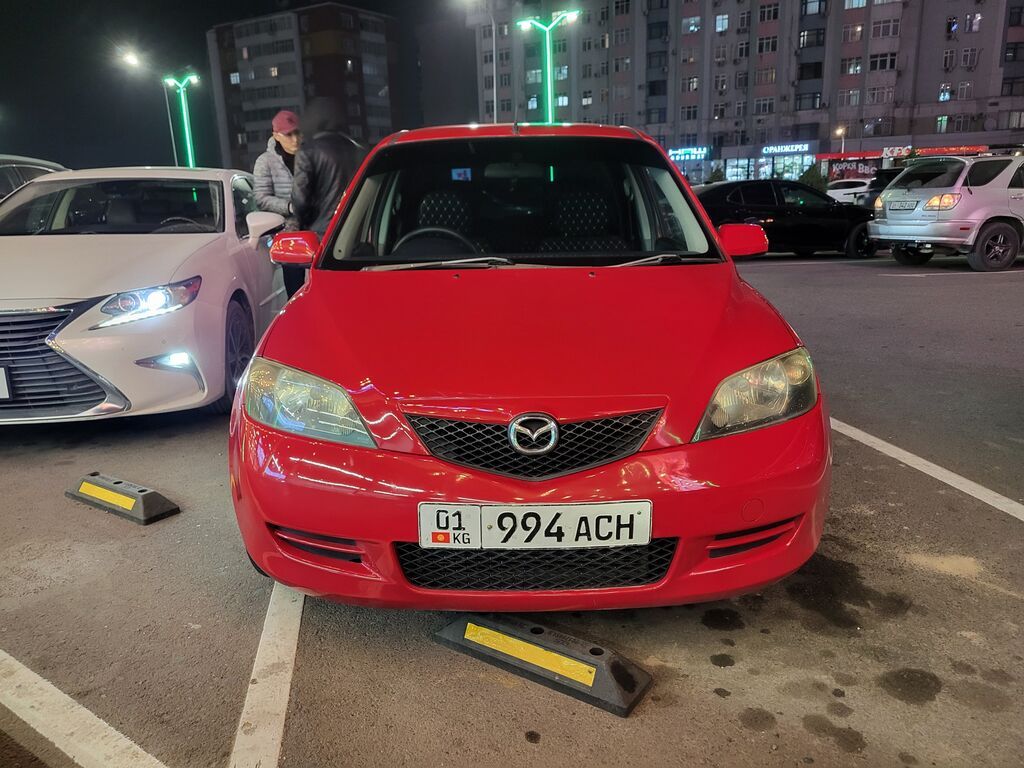 Mazda Demio: 2004 г., 1.5 л, Автомат, Газ, Хэтчбэк: фото 3