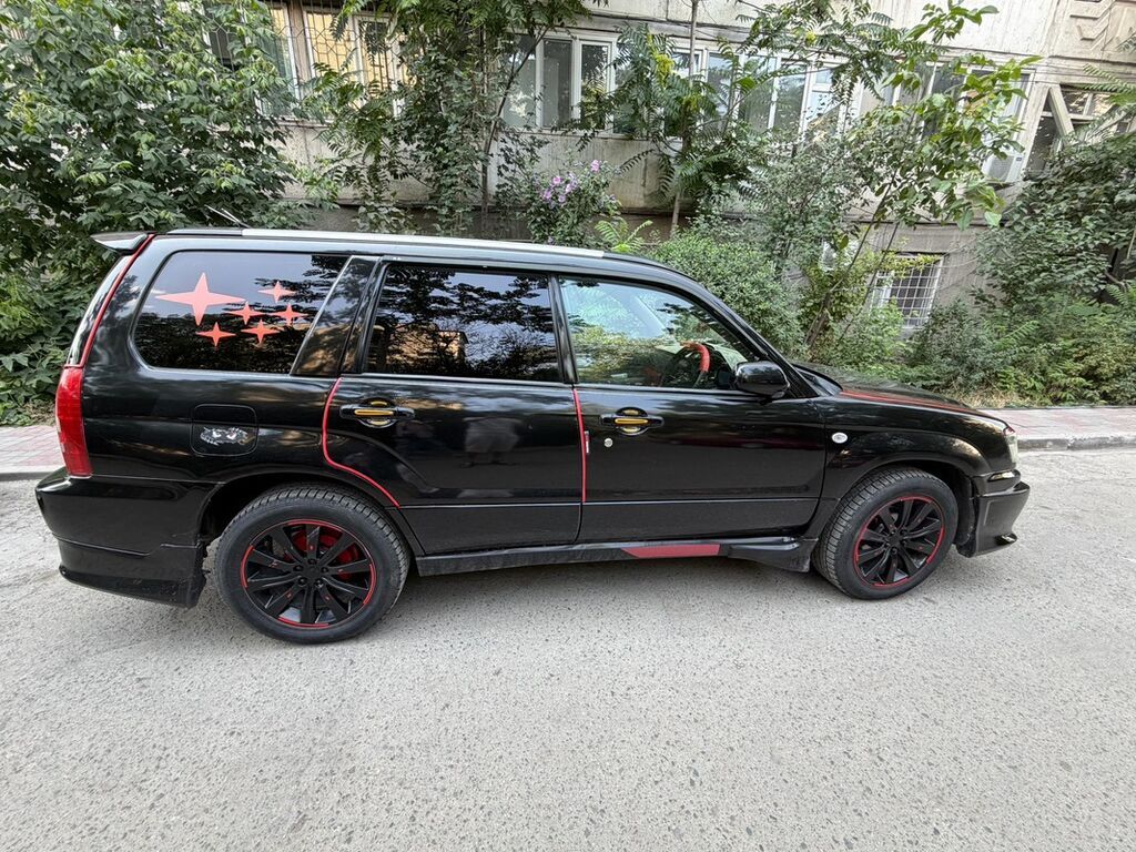 Subaru Forester: 2004 г., Автомат, Бензин, Кроссовер — фото 2