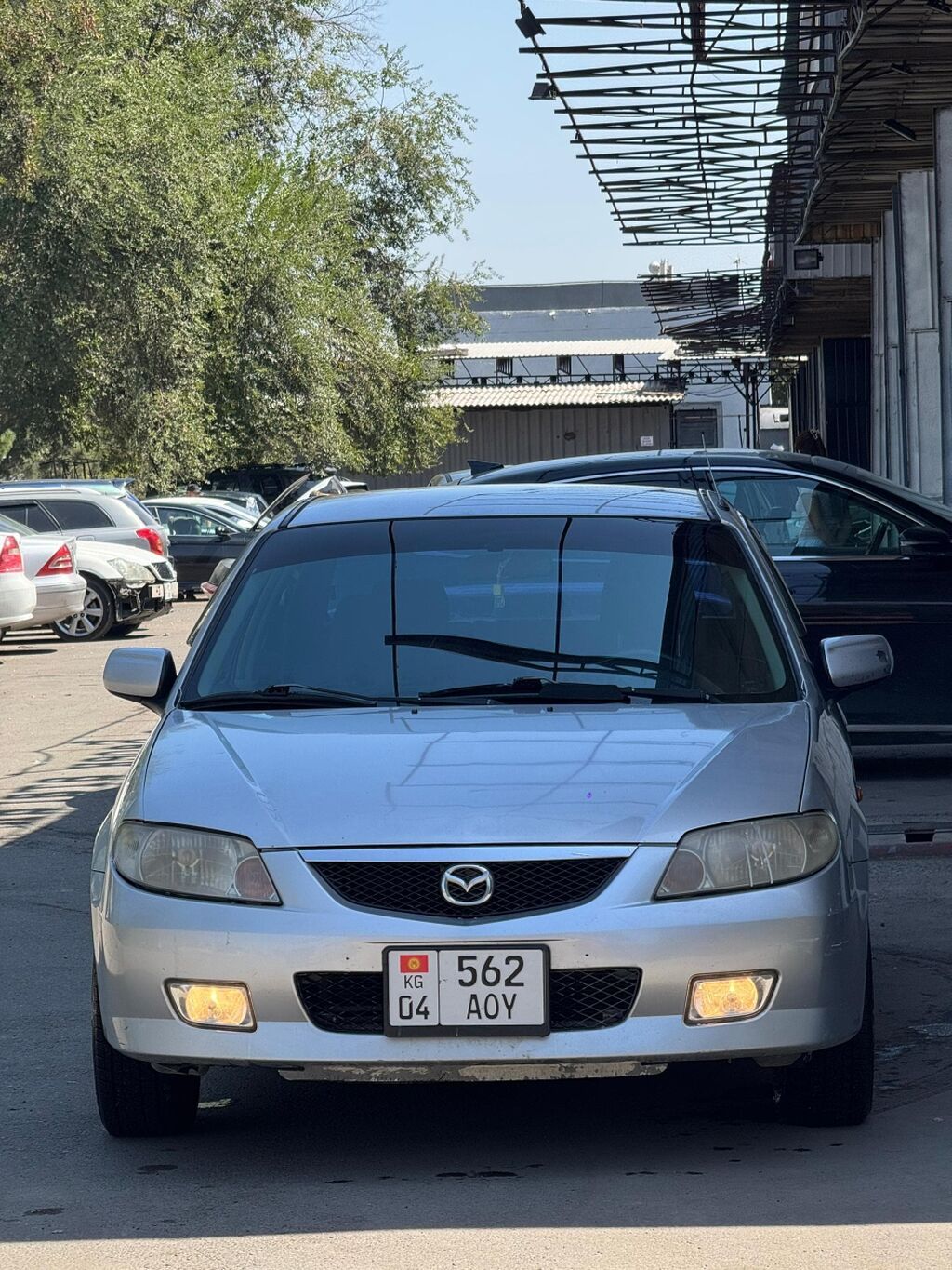 Mazda 323: 2002 г., 1.6 л, Автомат, Бензин, Седан: фото 2