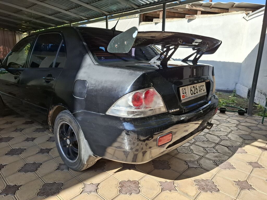 Mitsubishi Lancer: 2005 г., 1.6 л, Автомат, Бензин, Седан: фото 4
