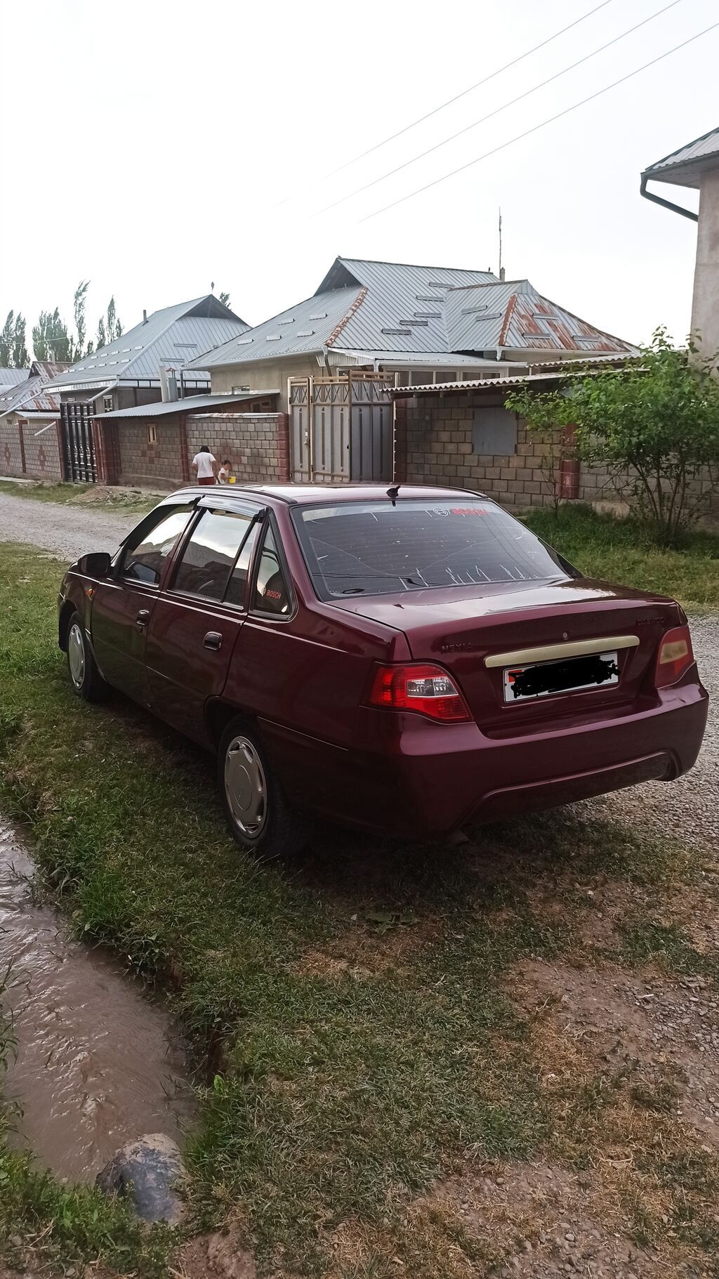 Daewoo Nexia: 2011 г., 1.5 л, Механика, Бензин, Седан: фото 2