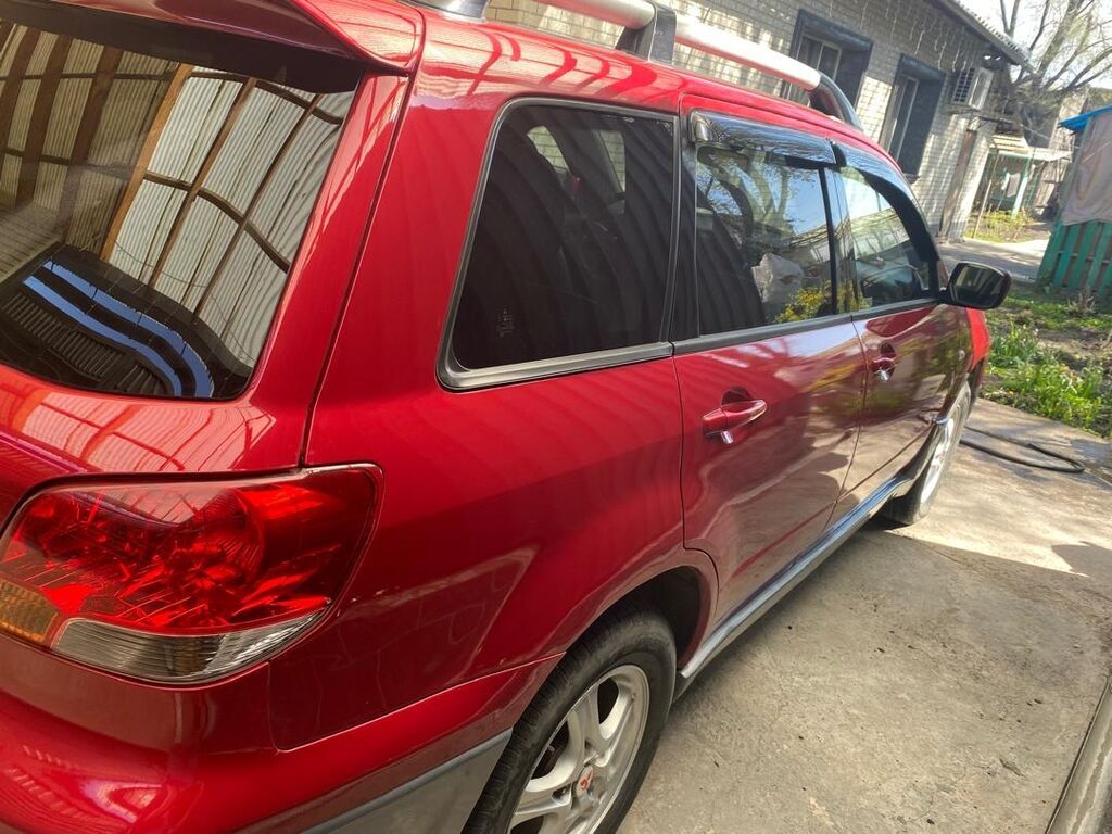 Mitsubishi Outlander: 2004 г., 2.4 л, Автомат, Газ, Универсал: фото 2