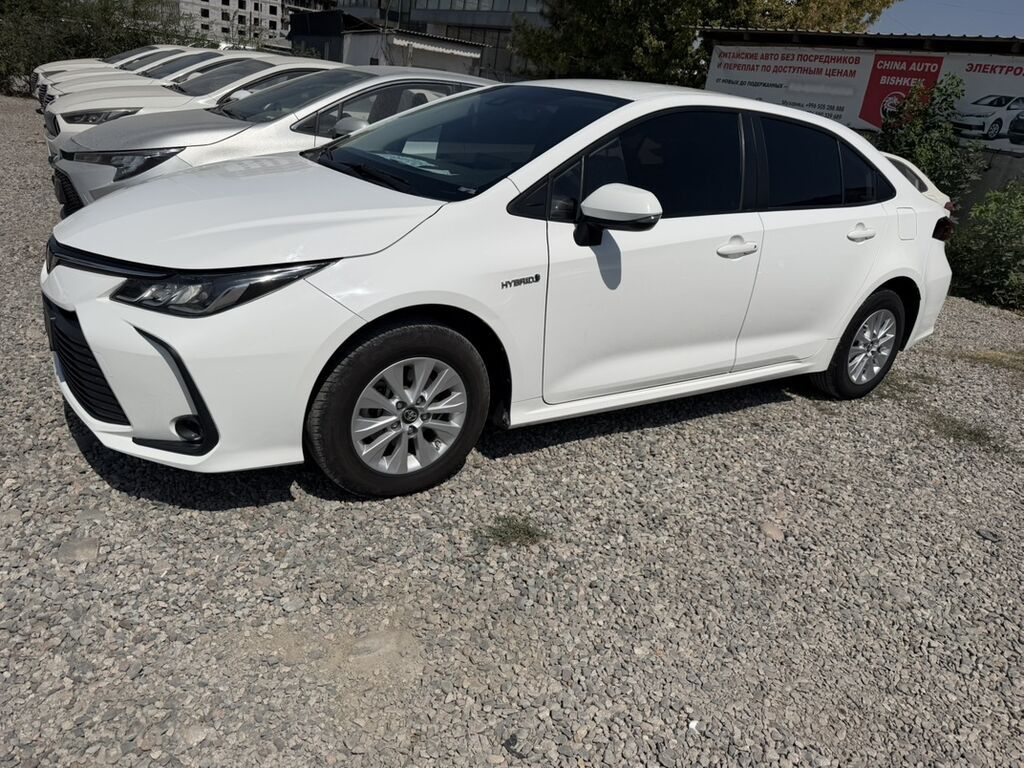 Toyota Corolla: 2022 г., 1.8 л, Автомат, Гибрид, Седан: фото 2