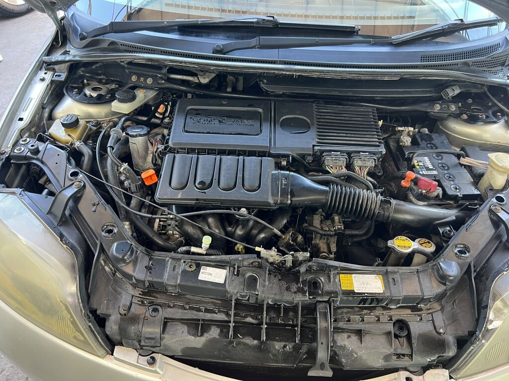 Mazda Demio: 2004 г., 1.3 л, Автомат, Бензин, Хэтчбэк — фото 6