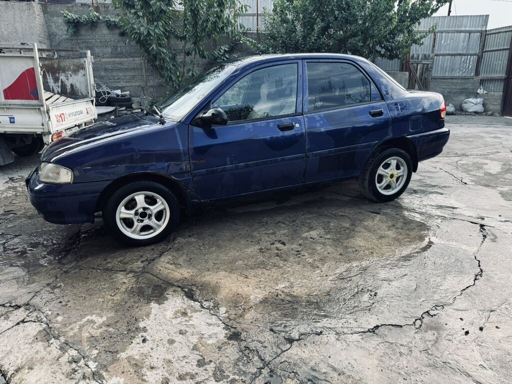 Kia Avella: 1998 г., 1.5 л, Механика, Бензин, Седан: фото 2