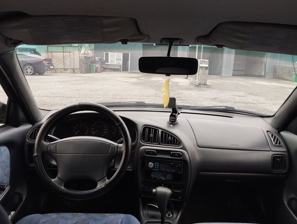 Suzuki Baleno: 1997 г., 1.3 л, Автомат, Бензин, Седан: фото 8