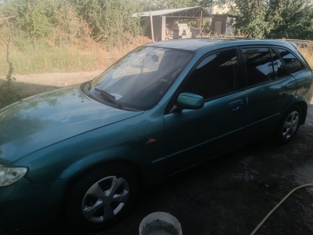 Mazda Familia: 2003 г., 1.6 л, Механика, Газ, Универсал: фото 4