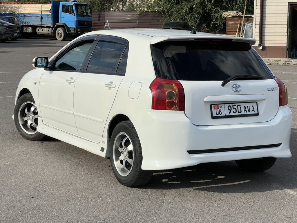 Toyota Allex: 2003 г., 1.5 л, Автомат, Бензин, Хэтчбэк — фото 2