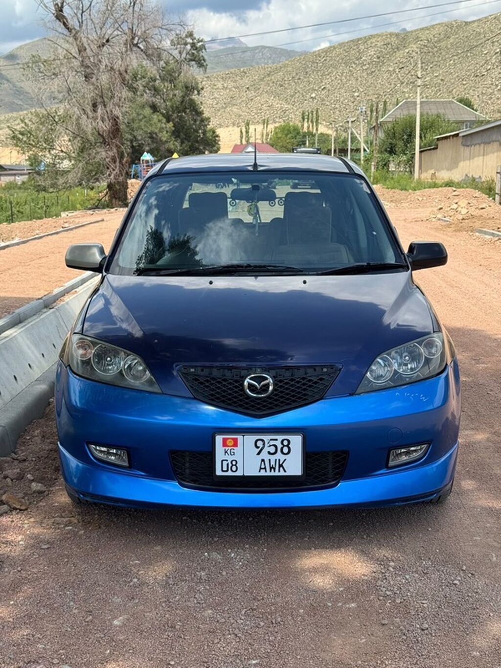 Mazda Demio: 2003 г., 1.3 л, Автомат, Бензин, Хэтчбэк: фото 1
