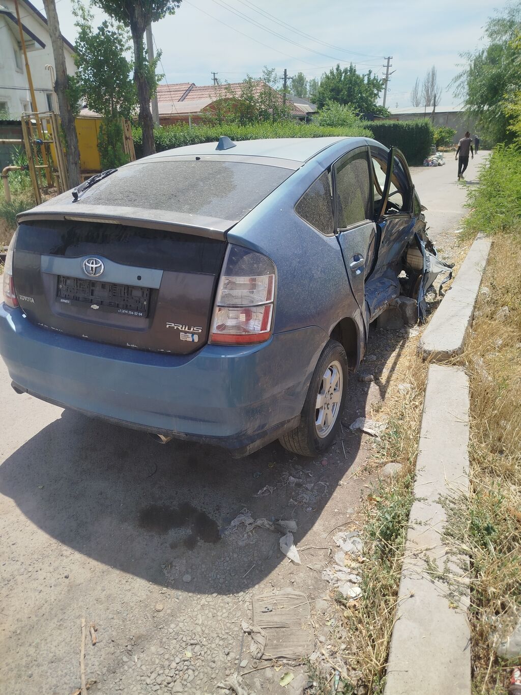 Toyota Prius (XW20), гибридный хэтчбек 5 дв. Основные характеристики: фото 5