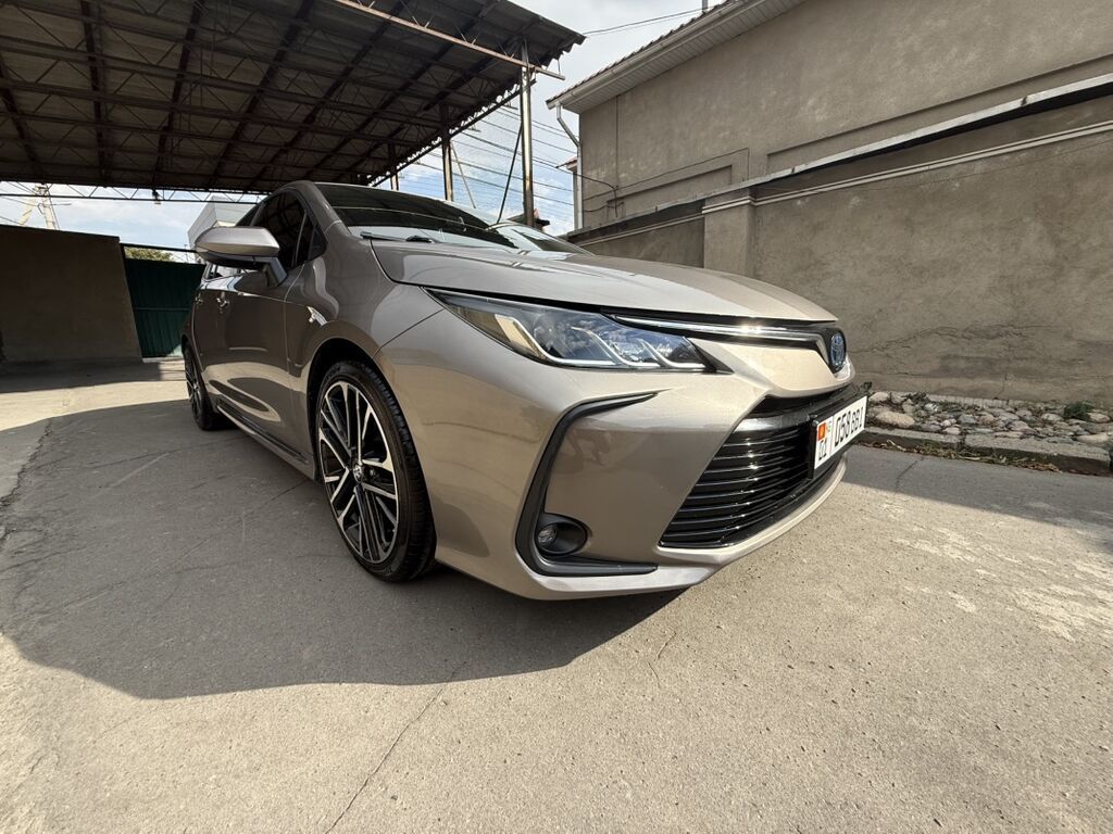 Toyota Corolla: 2021 г., 1.8 л, Автомат, Гибрид, Седан: фото 4