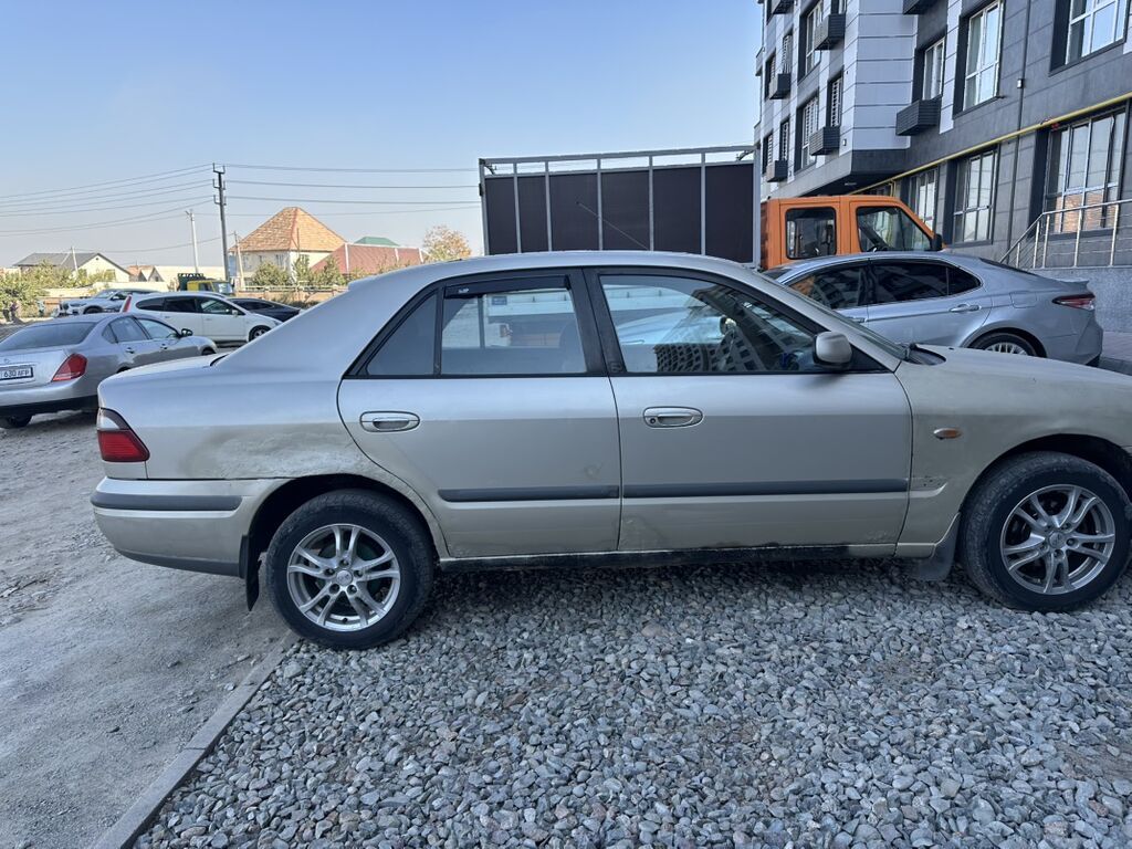 Mazda 626: 1998 г., 1.8 л, Механика, Бензин, Седан: фото 6