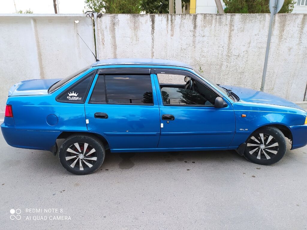 Daewoo Nexia: 2010 г., 1.5 л, Механика, Седан: фото 6