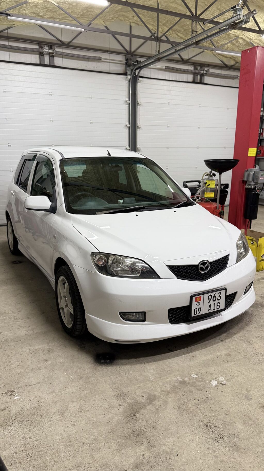 Mazda Demio: 2004 г., 1.5 л, Автомат, Бензин, Хэтчбэк: фото 2