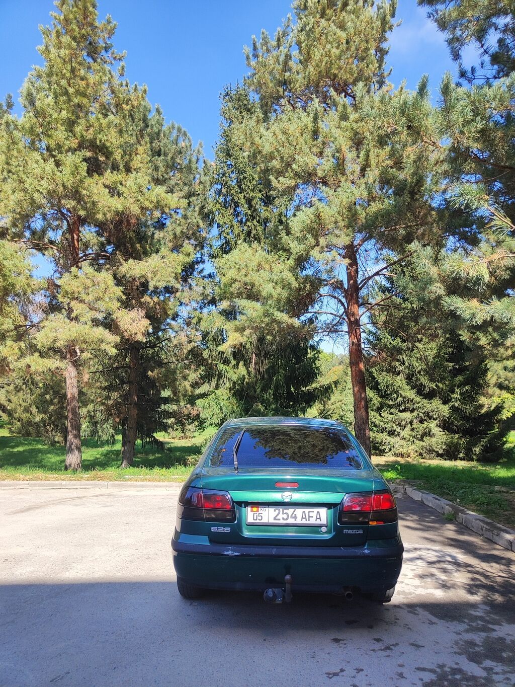 Продаётся легковой автомобиль седан тёмно‑зелёного цвета. Кузов: фото 4