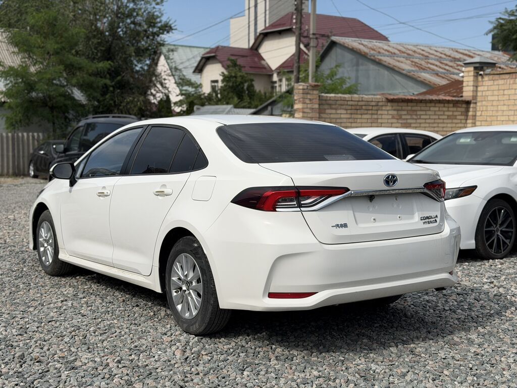 Toyota Corolla: 2022 г., 1.8 л, Вариатор, Гибрид, Седан: фото 4
