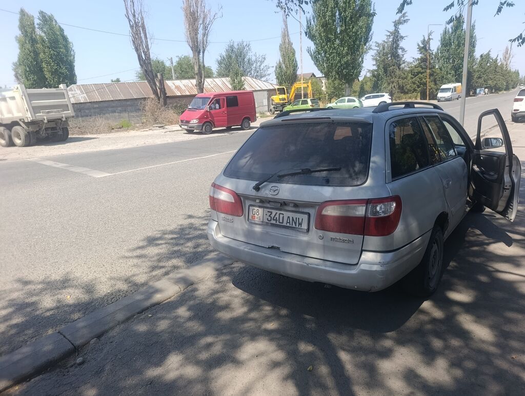 Mazda Capella 2001 г., универсал, 2.0 л, механика: фото 6