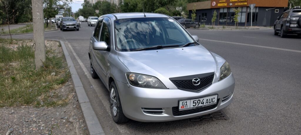 Mazda Demio: 2003 г., Автомат, Бензин: фото 7