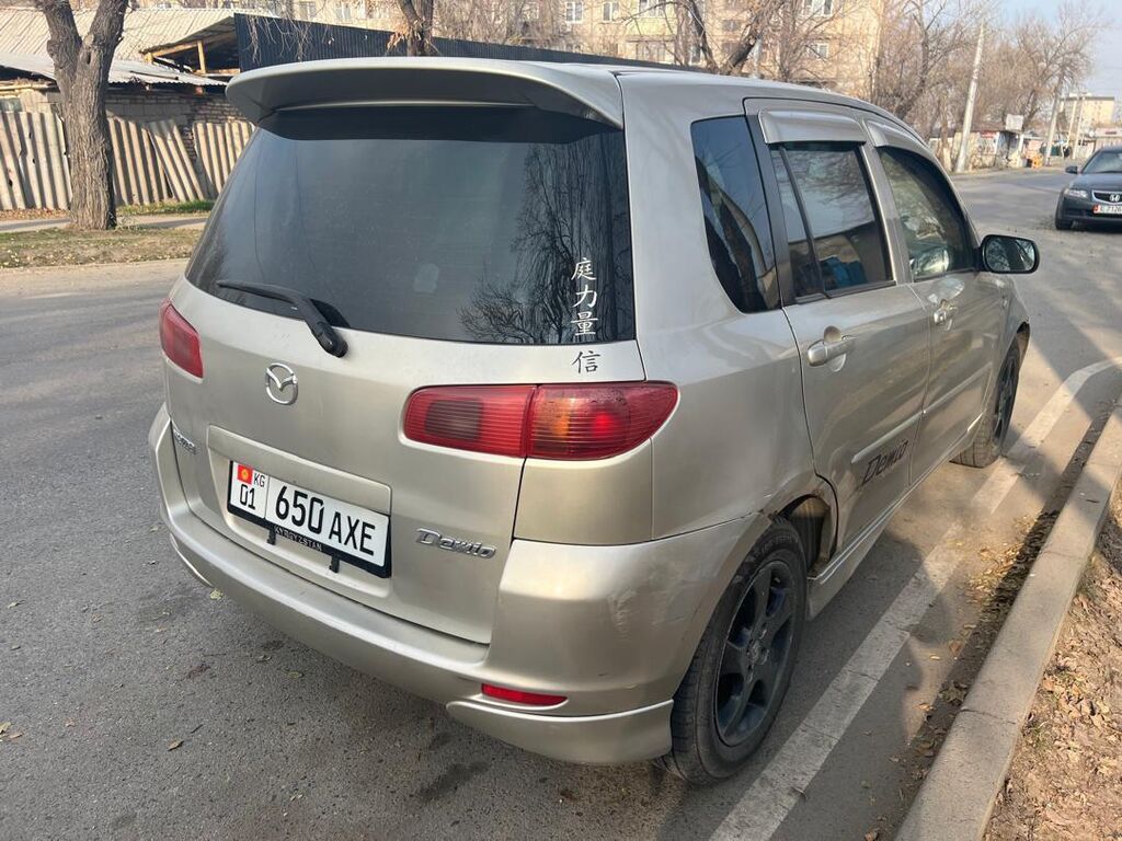 Mazda Demio: 2003 г., 1.3 л, Автомат, Бензин, Хэтчбэк: фото 3